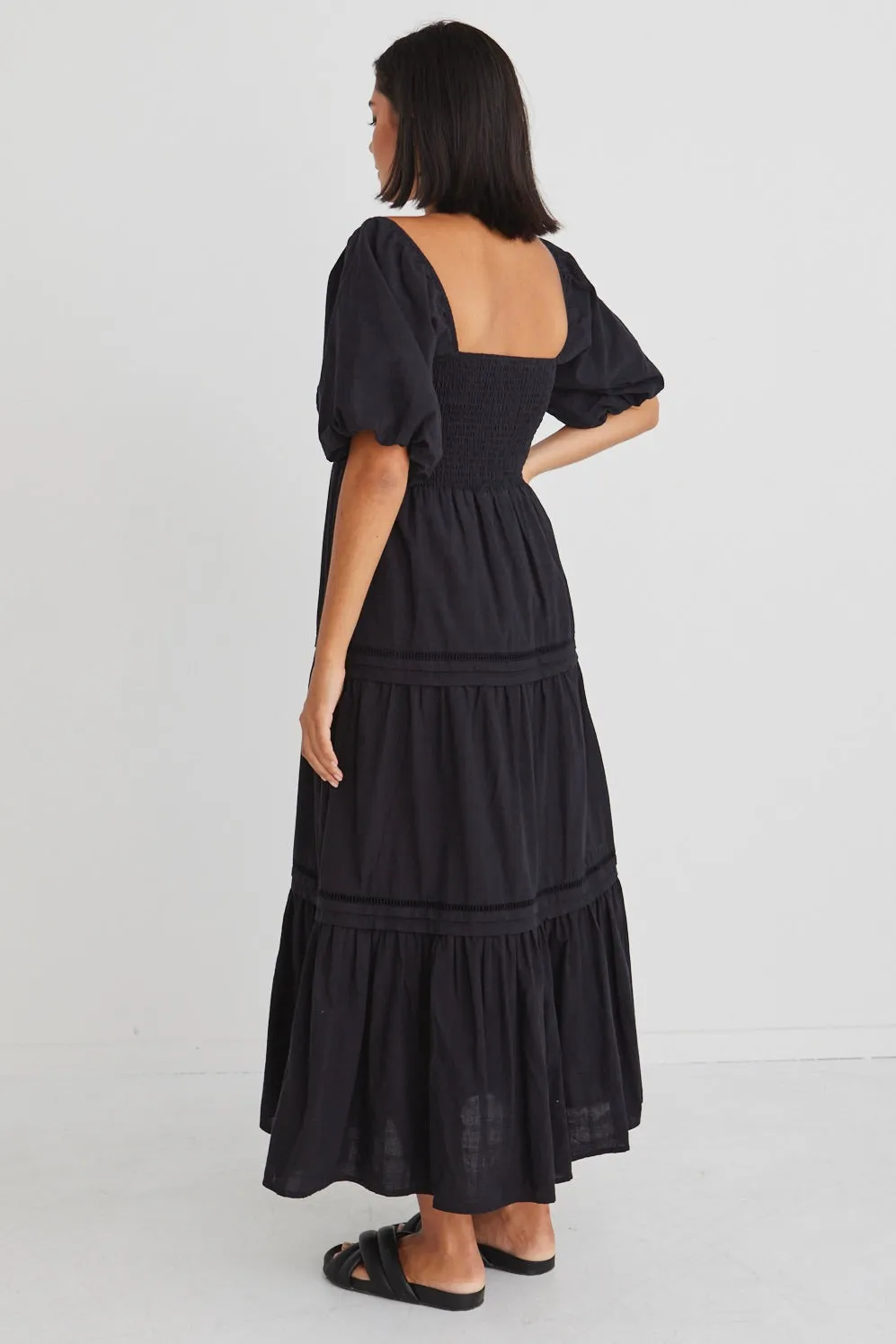 Chic Captivate Midi Dress in Black with Puffed Sleeves and Tiered Cotton Design