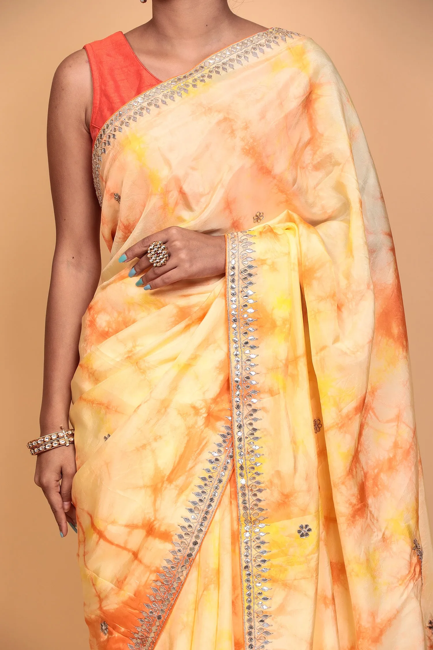 Crepe silk Saree with Gota Patti, Tie & Dye work.