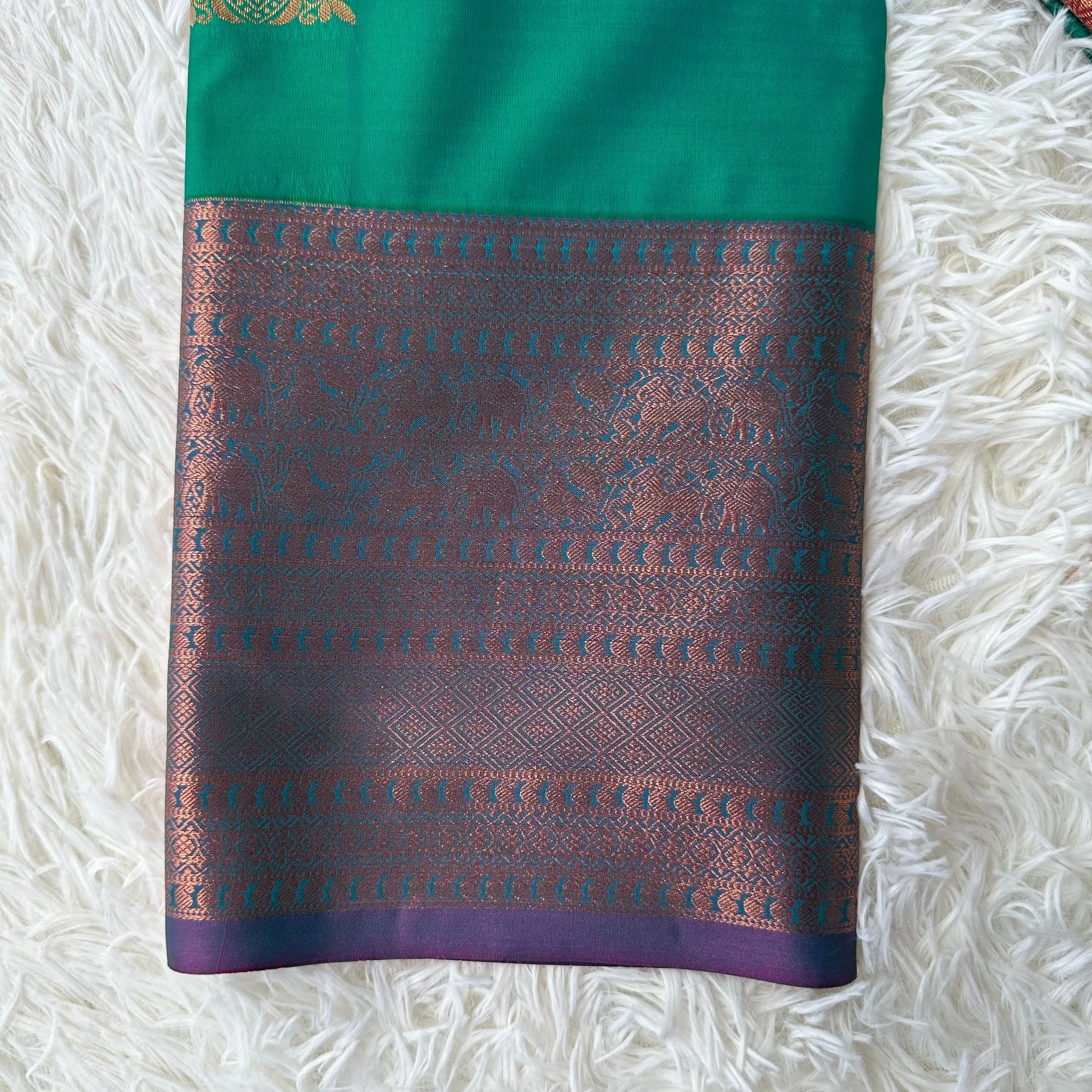 The Natural Beauty Jungle Green Semi Silk Saree With Pink Rich Zari Border