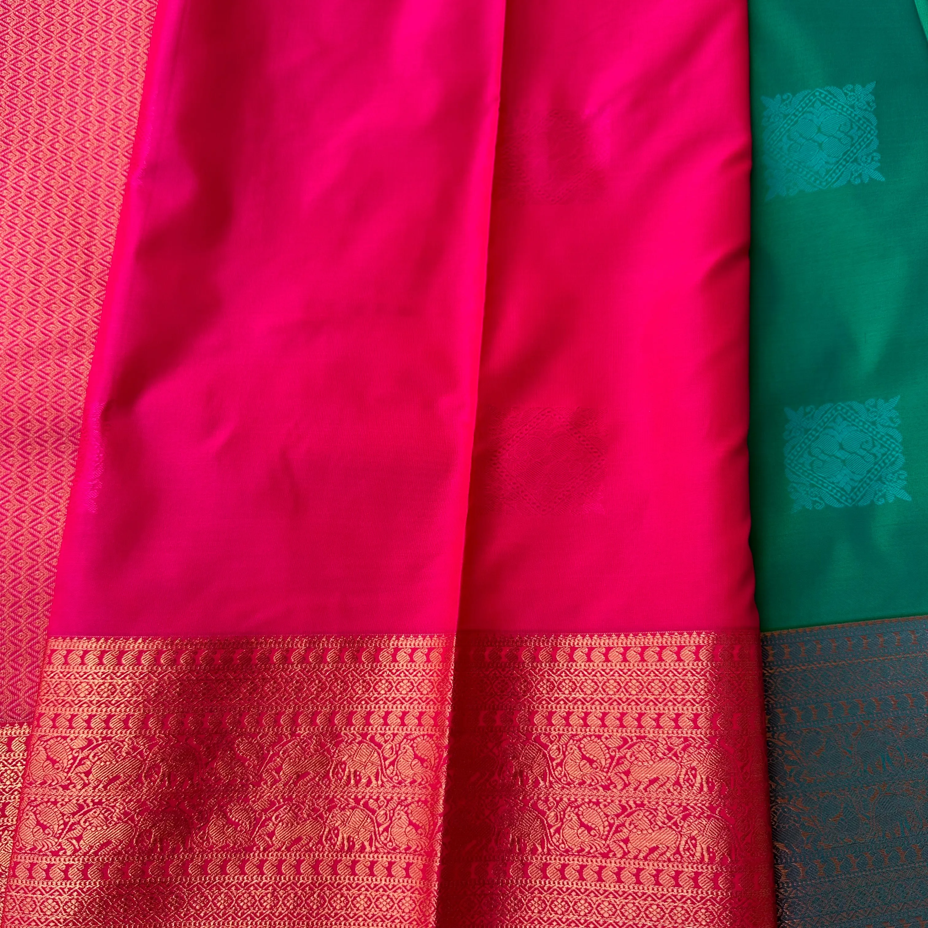 The Natural Beauty Jungle Green Semi Silk Saree With Pink Rich Zari Border