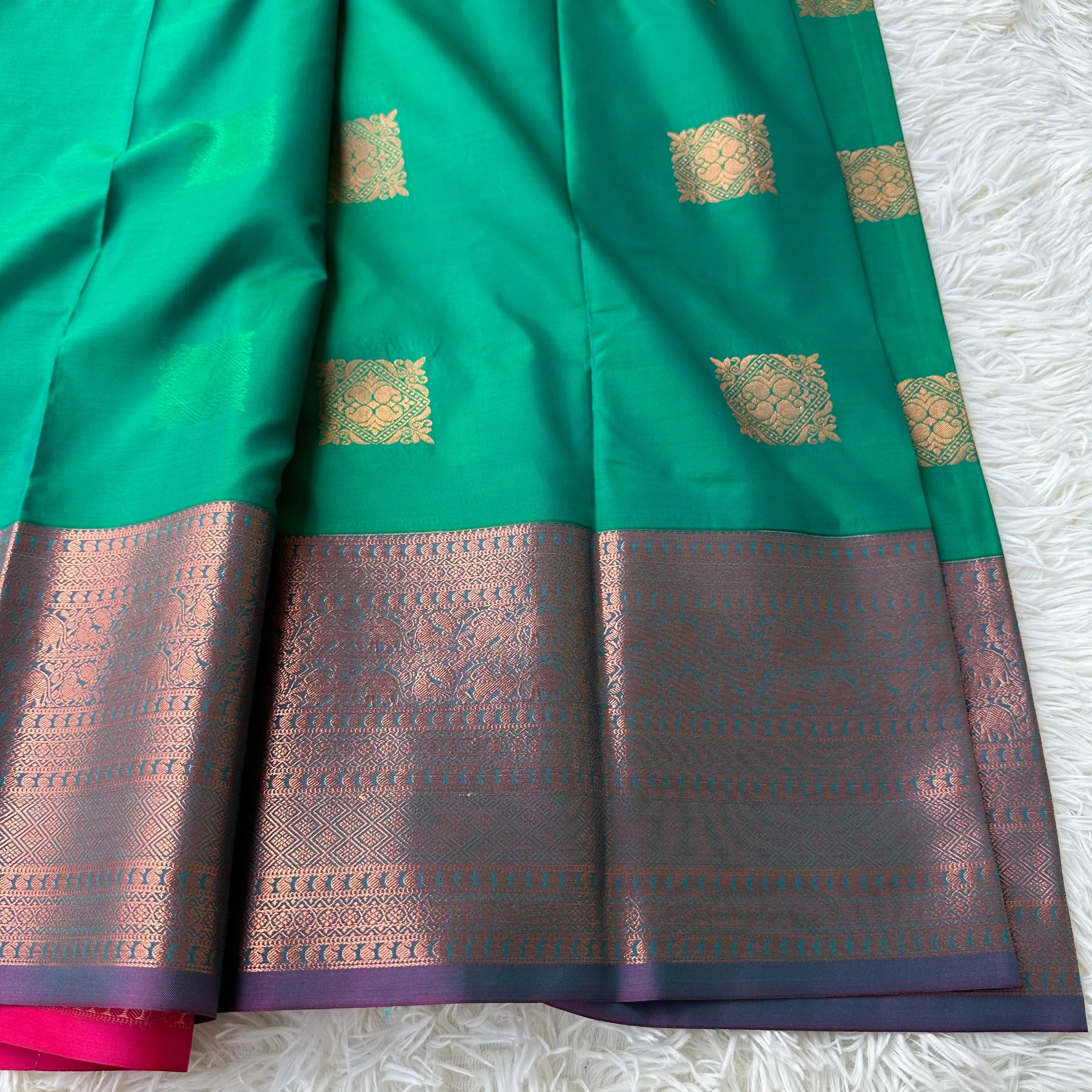 The Natural Beauty Jungle Green Semi Silk Saree With Pink Rich Zari Border